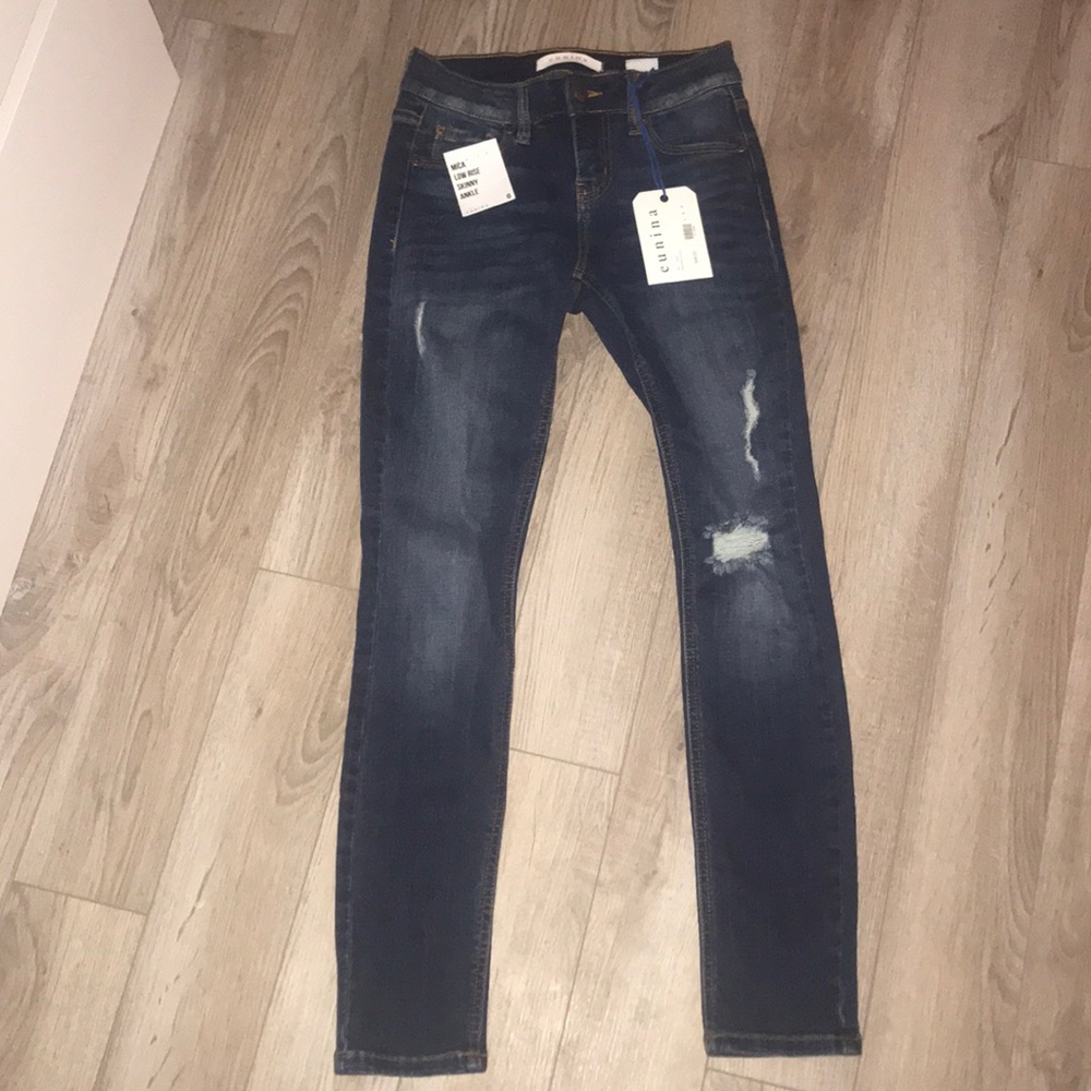 lightly ripped jeans